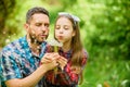 Daughter and father love dandelion flower. family summer farm. spring village country. little girl and happy man dad Royalty Free Stock Photo