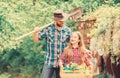 Daughter and father on ranch. little girl and happy man dad. earth day. spring village country. ecology. Gardening tools Royalty Free Stock Photo