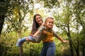 Daughter fly in Moms arms.