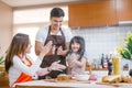 Daughter help parent preparing the bake Family concept