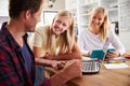 Daughter helping her parents with new technology Royalty Free Stock Photo