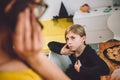 Daughter listen mothers conversation on smart phone