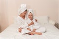 Daughter love smiling bath dries mom thinks elbows smile copyspace, concept white morning for lifestyle and skin beauty