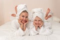 Daughter mom love smiling dries bath thinks elbows smile bathrobe, for portrait cute from woman from hotel beautiful