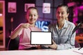 Daughter and mother being sponsored by partnering brand to do mockup laptop unboxing content Royalty Free Stock Photo