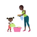 Daughter and mother doing laundry, carry dirty clothes to basket