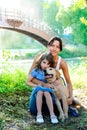 Daughter and mother with golden retriever Royalty Free Stock Photo