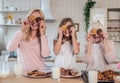 Daughter, mother and grandmother cooking on kitchen. Women generation baking together