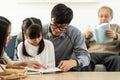 Daughter reading story with multigenerational family