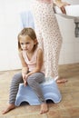 Daughter Reluctant To Brush Teeth With Mother