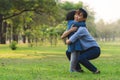 Daughter running to hug mother in the garden Royalty Free Stock Photo