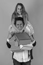 Daughter sits on shoulders. Girl and man with cheerful faces