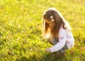 Daughter at sunset playing