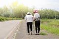 Daughter take care elderly woman walking on street Royalty Free Stock Photo