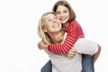 Daughter teenager and mother laugh and hug. Love and support in family relationships. White background. Space for text