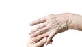 Daughter touching elderly mom hand for take care of