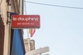 Dauphine Libere logo in front of one of their resellers. Dauphine Libere is a local news and events newspaper from the departement