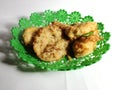 A Bunch Fried food ( Bakwan ) and banana and tofu on a green plate in the room