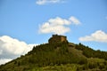 Davalillo Castle on top of the mountain with cloudy blue sky. Royalty Free Stock Photo