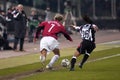 David Beckham and Edgar Davids in action during the match