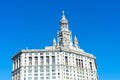 David N. Dinkins Manhattan Municipal Building rear view from the Brooklyn Bridge. Blue sky - New York, USA - 2022