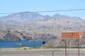 Davis Dam Sign and a Katherine Landing Sign over the border of Arizona and Nevada on Mohave Lake. Lake Mead National Recreation Ar Royalty Free Stock Photo