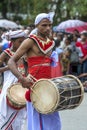 A Davul player performs during the Day Perahera.