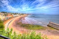 Dawlish Devon England with beach railway track and sea on blue sky summer day in HDR Royalty Free Stock Photo