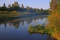 Dawn on the bank of a winding river