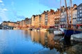 Dawn at Honfleur harbor with boats and reflections, France Royalty Free Stock Photo