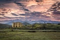 Dawn breaking over old farm buildings in Corsica Royalty Free Stock Photo