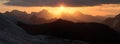 Dawn in the Caucasus Mountains, panorama landscape. Ridge, sharp peaks. Traveling in the mountains Royalty Free Stock Photo