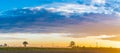 Dawn on cultivated fields Royalty Free Stock Photo