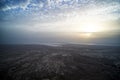 dawn of the dead sea. Beautiful sunset on the dead sea in front of the Judean desert. The sun Peeps out from behind the clouds. Royalty Free Stock Photo