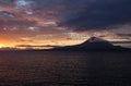 The dawn lights illuminate the island of Pico and its volcano, Pico island, Azores