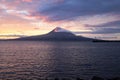 The dawn lights illuminate the island of Pico and its volcano, Pico island, Azores