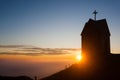 Dawn at the little church, mount Grappa landscape, Italy