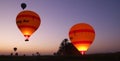 Dawn and the morning glow from Hot Balloons taking off near The Valley of Kings Luxor Egypt