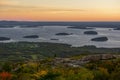 Dawn from a mountain overlooking the bay of the Atlantic Ocean with islands and the town. USA. Park Acadia. Mount Cadilac. Royalty Free Stock Photo