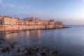 The dawn of a new day on the beautiful seafront of Ortigia
