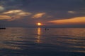 Dawn over the Black Sea and a man on a kayak who meets him. Royalty Free Stock Photo