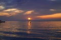 Dawn over the Black Sea and a man on a kayak who meets him. Royalty Free Stock Photo