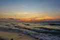 Dawn over the Caribbean Sea. The sky above the horizon is highlighted in orange. Royalty Free Stock Photo