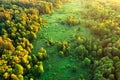 Dawn over the meadow. A wonderful summer landscape. Drone view. Morning fog. Royalty Free Stock Photo