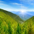 Dawn in the picturesque mountains covered with forests Royalty Free Stock Photo