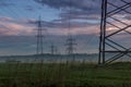 Dawn. Power lines in the fog. Sky