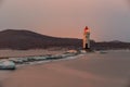 Tokarevsky lighthouse during a colorful dawn against the backdrop of a beautiful sea.