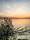 Dawn by the sea. Orange horizon and the sun comes out of the water