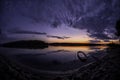 Sunken boat, at the shore of Danube river at dawn Royalty Free Stock Photo