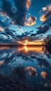 Dawn spectacle Time lapse captures clouds dancing over a tranquil lake Royalty Free Stock Photo